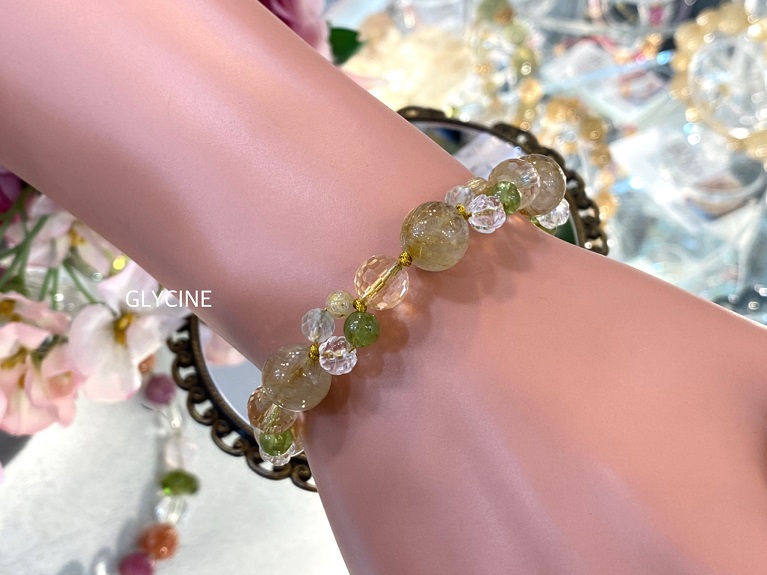 ルチルクオーツとシトリンにグリーン系の天然石と水晶を合わせた夏色  
